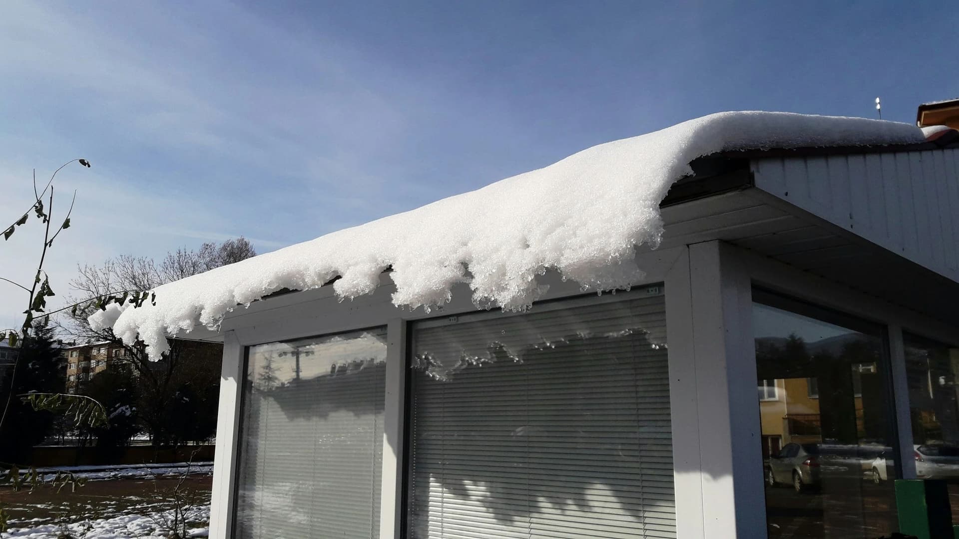 Blog post The Cost of Ice Dam Removal: What Homeowners Should Expect & Will Insurance Cover It? image