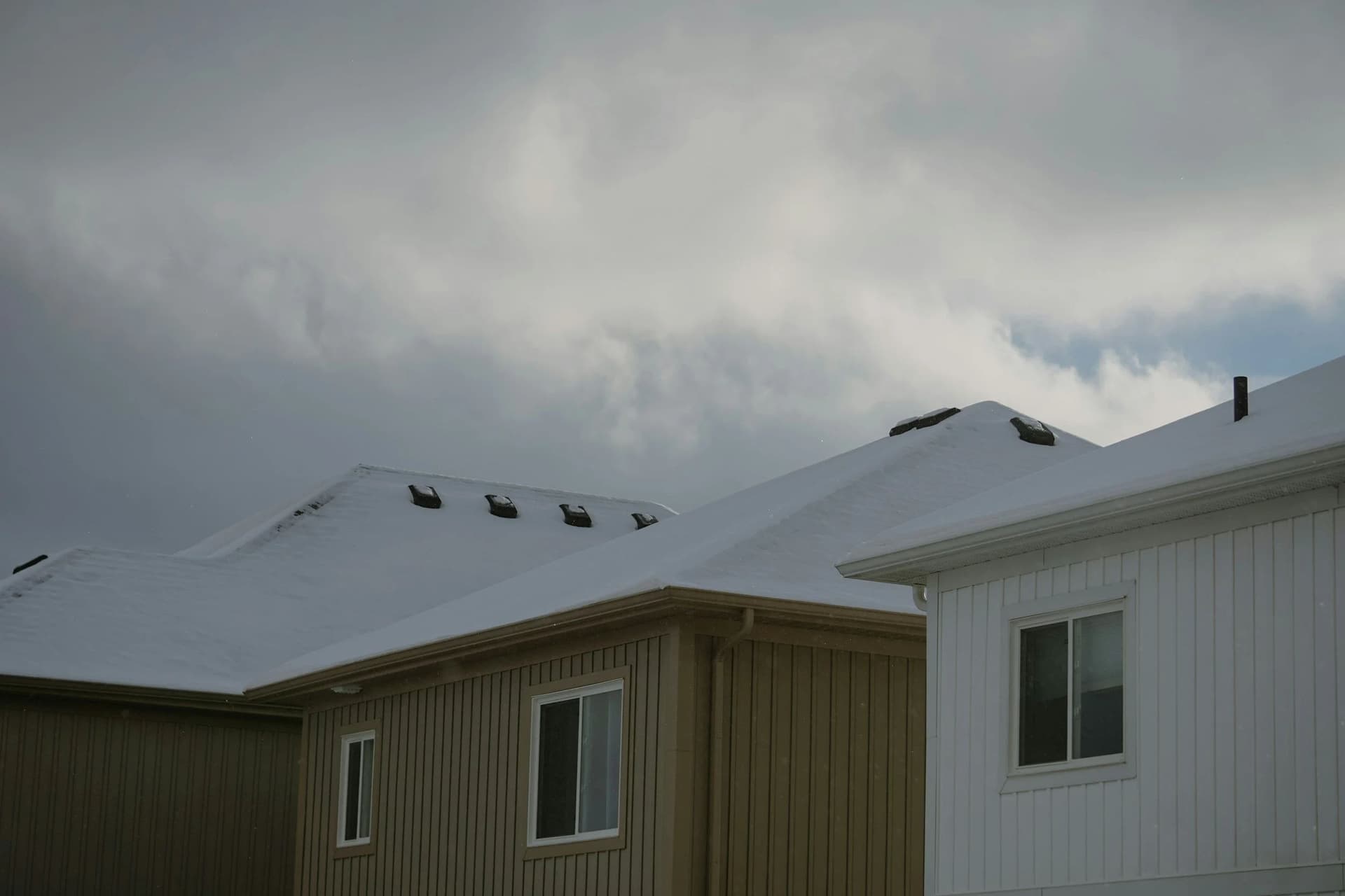 Blog post Roof Snow Removal Services vs. DIY: Preventing Ice Dams Before They Form image