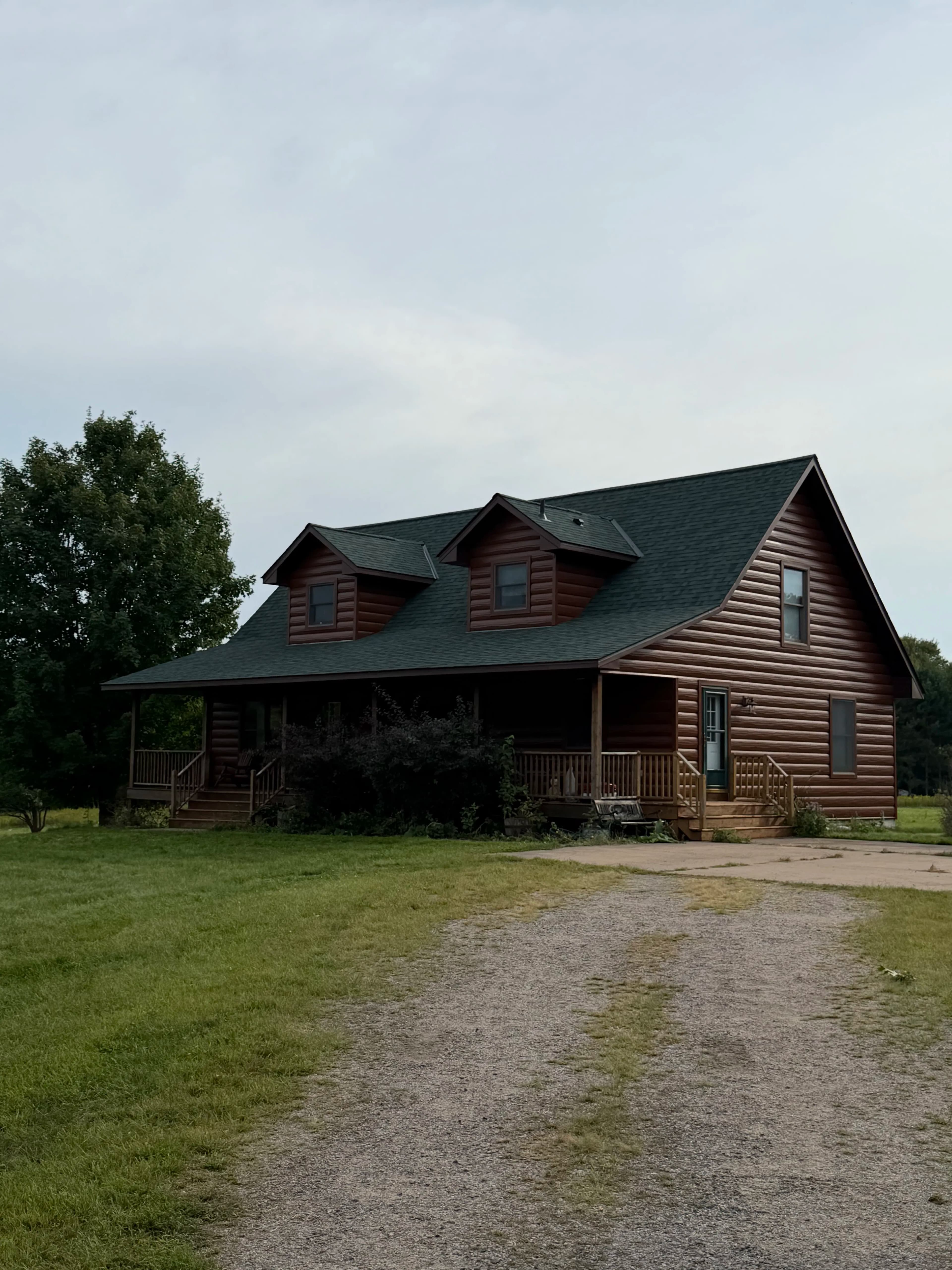 Project Owens Corning Chateau Green Roof Replacement on a Log Cabin Home image