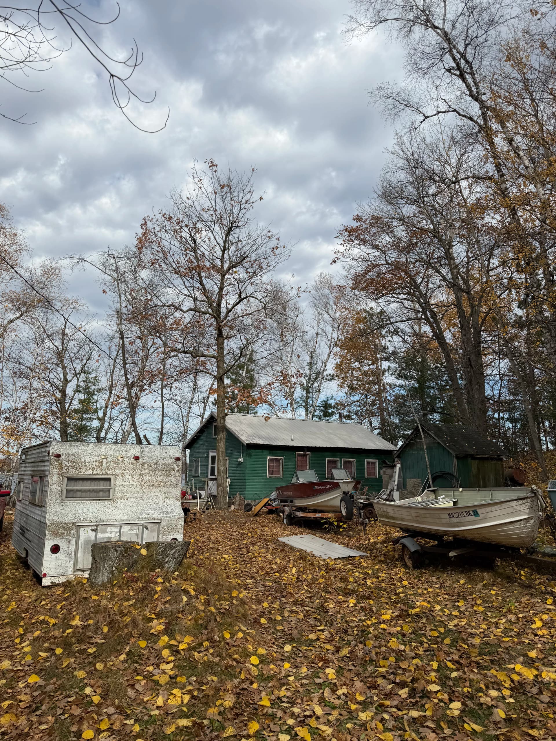 Ash Gray Steel Roof Install on a Classic Cabin image