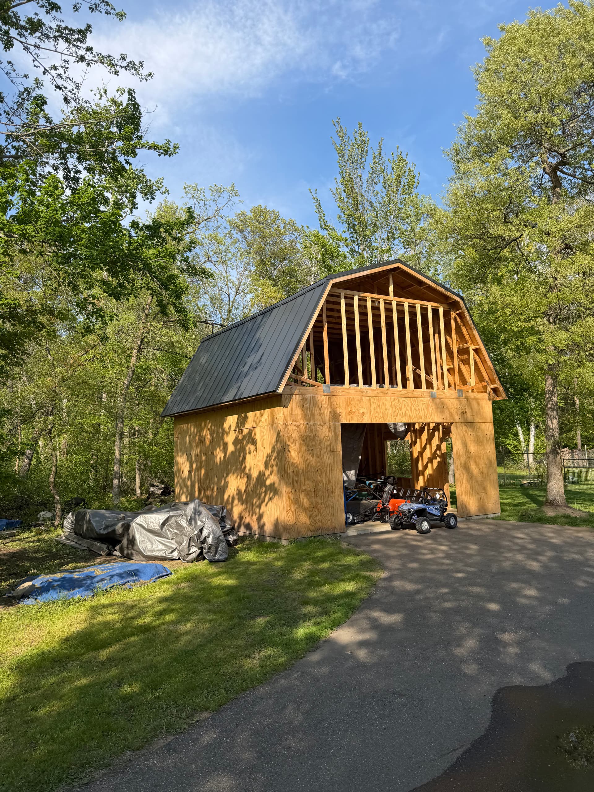 Standing Seam Metal Roof Install on a Gambrel Barn Build image