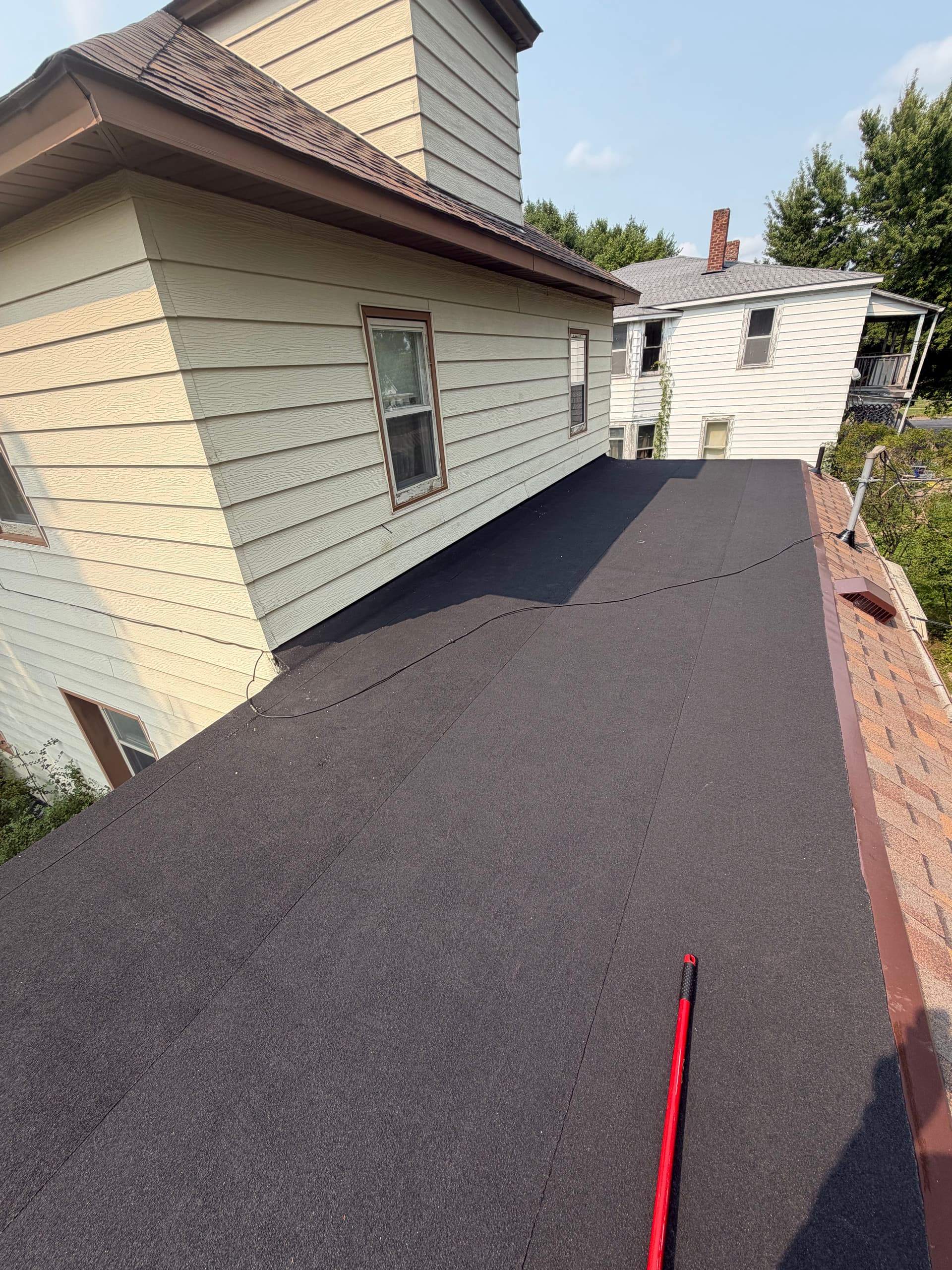 Gallery photos for 4 Layers Stripped Down to Fix This Flat Roof Right: Image #2