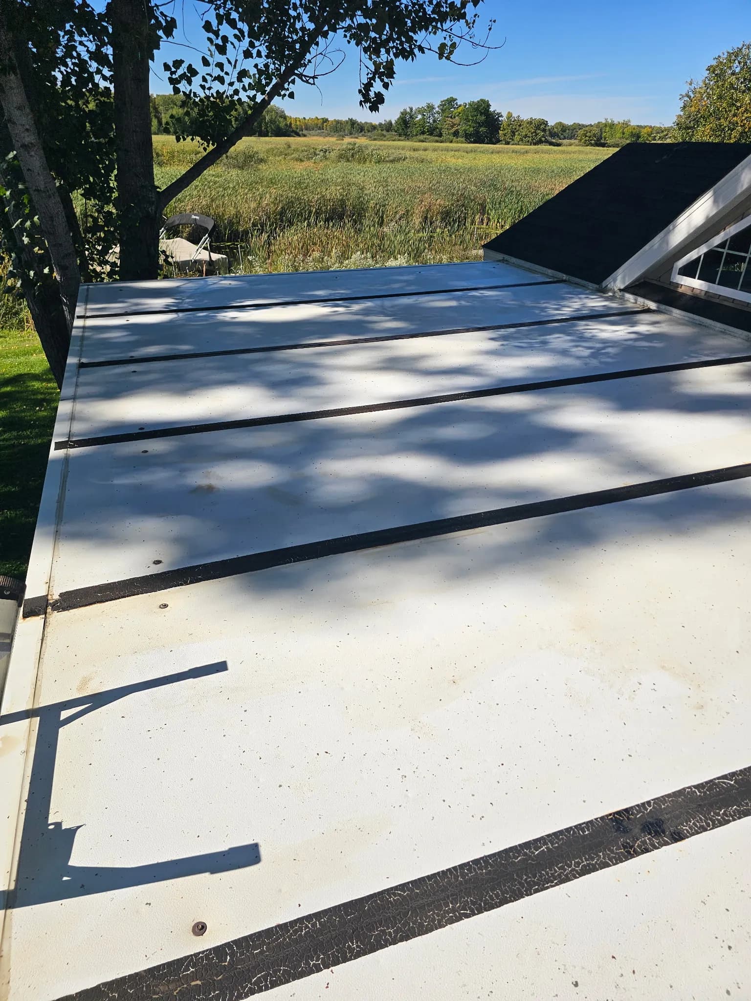 Gallery photos for Flat Screen Porch Roof Seam Repair Done Right: Image #1