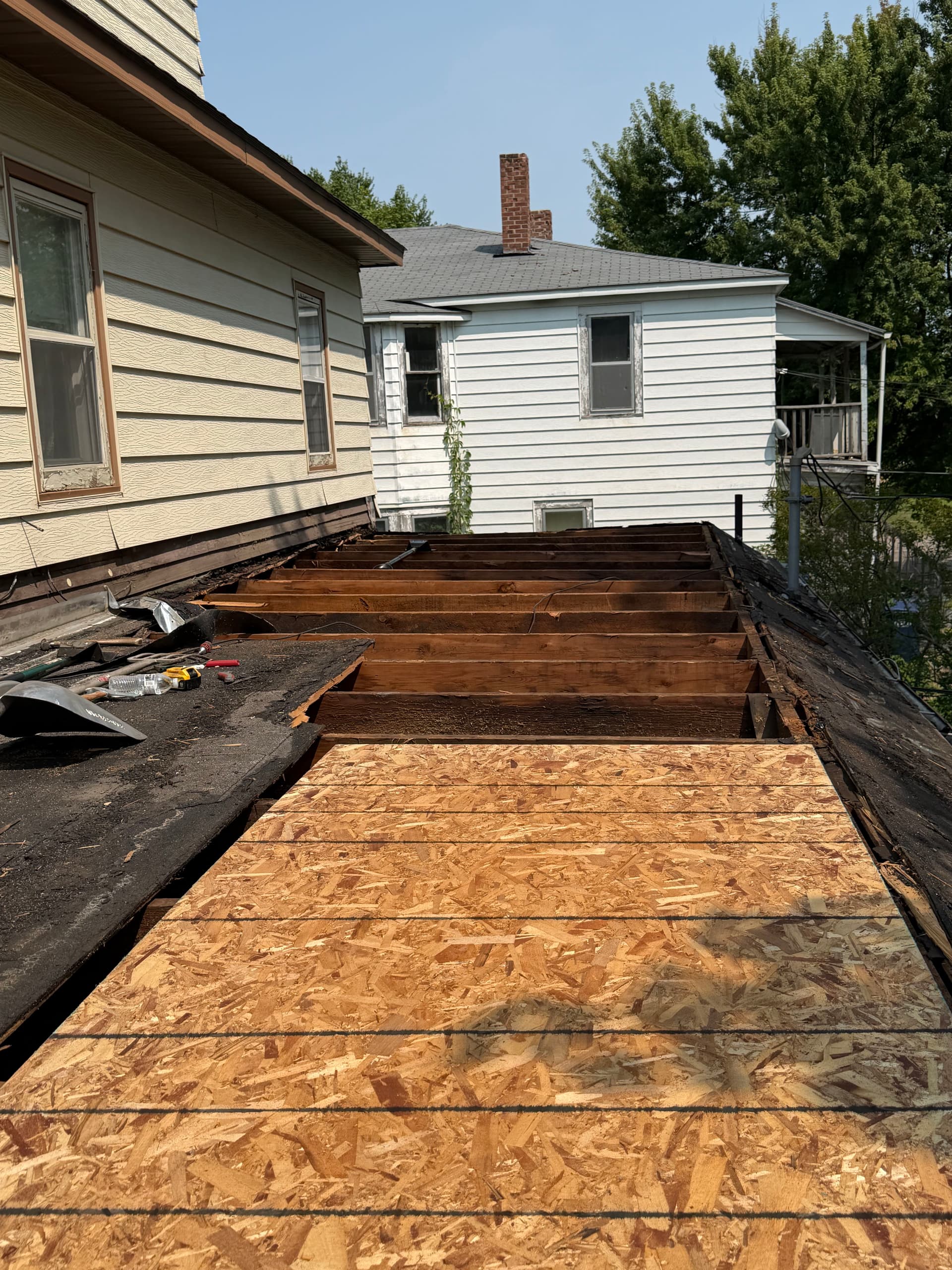 Gallery photos for Storm Damage Flat Roof Repair Uncovered 6 Layers of Roofing: Image #3