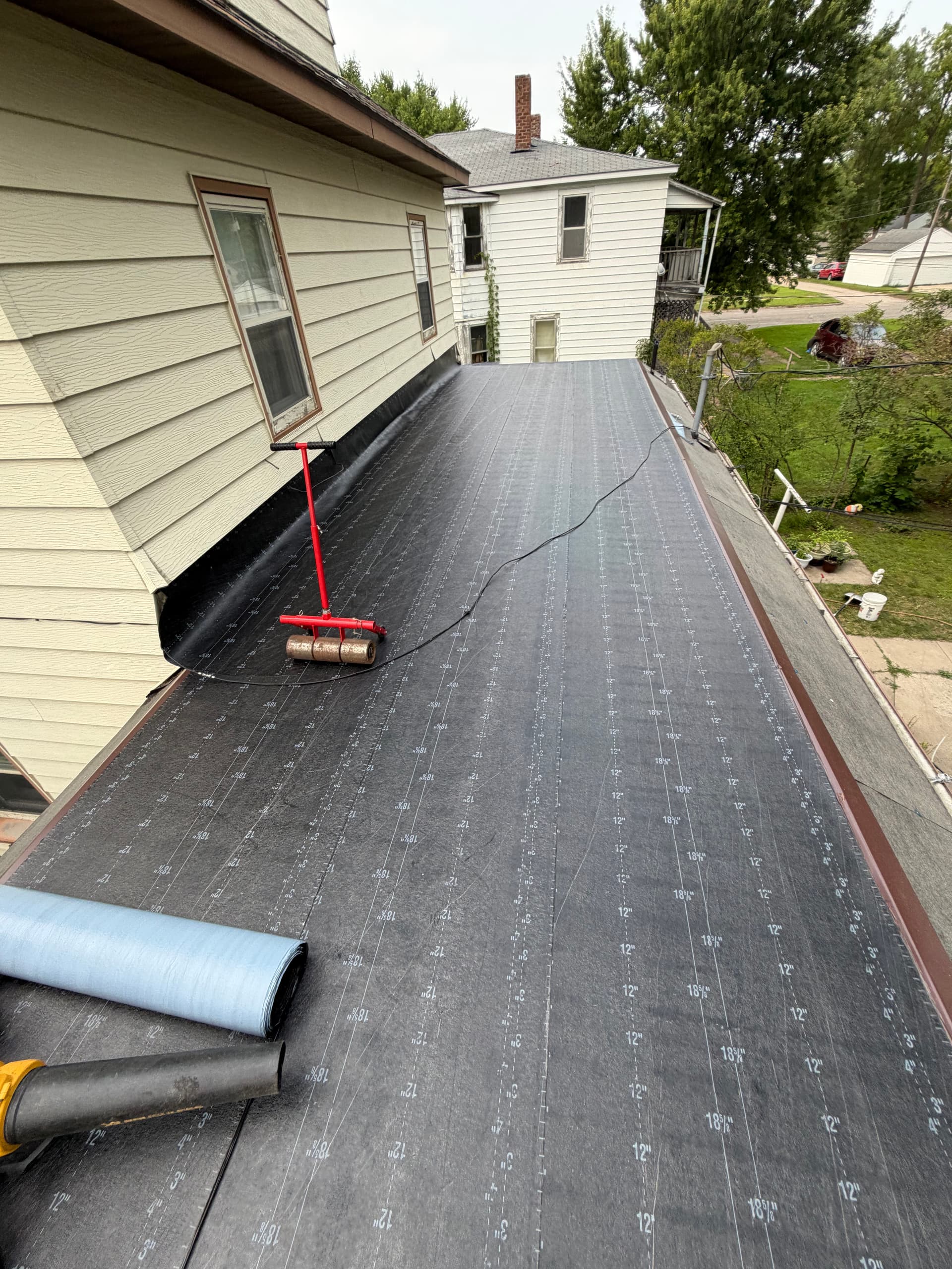 Gallery photos for Storm Damage Flat Roof Repair Uncovered 6 Layers of Roofing: Image #5